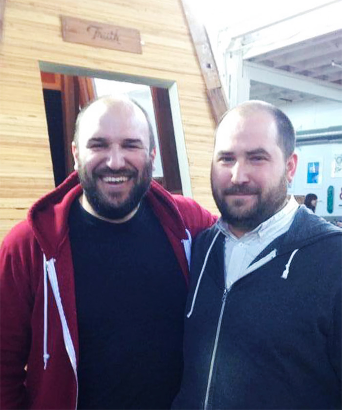 Two doppelgangers hugging in the store 