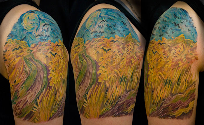 Classical art-inspired tattoo of a vibrant field with a winding path and sky, influenced by a famous painting style.