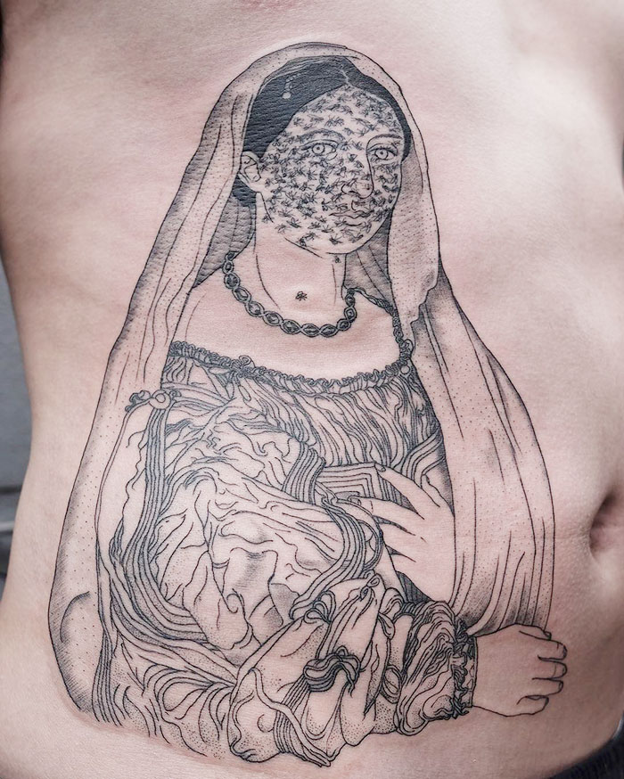 Classical art-inspired tattoo of a veiled woman with intricate detailing on the torso.