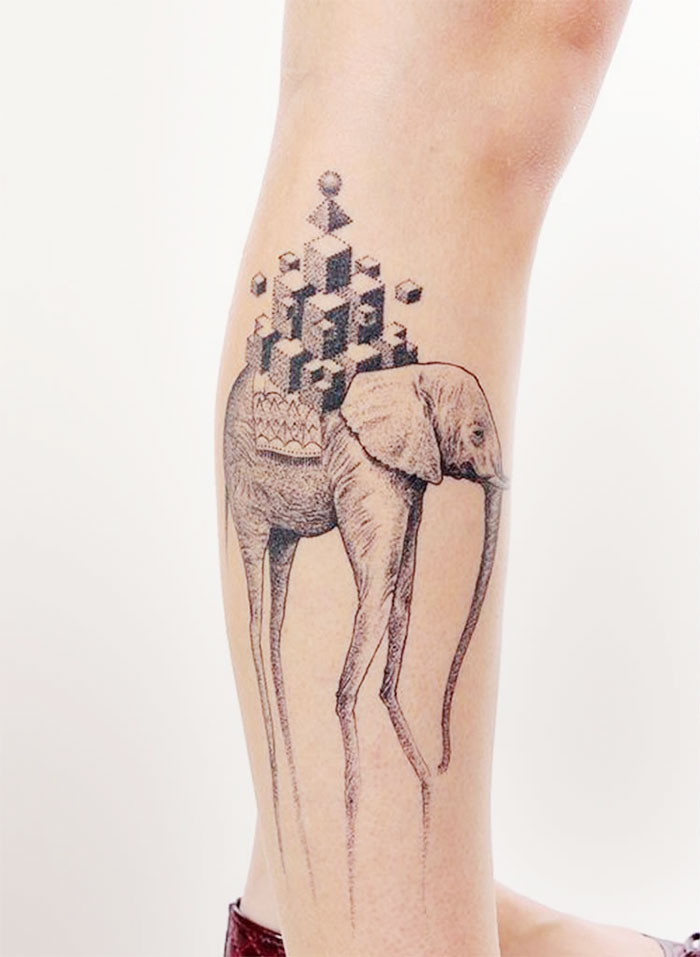 Classical art-inspired tattoo of an elephant with elongated legs and geometric shapes on a person's calf.
