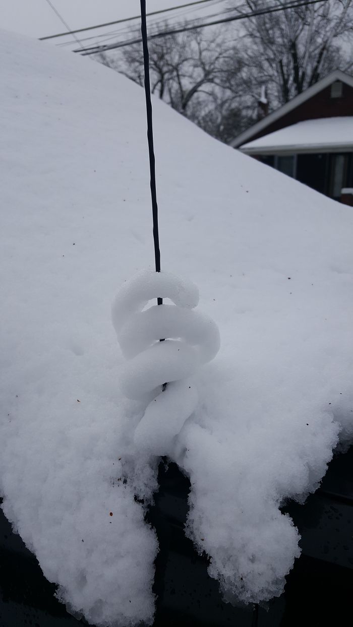 The Way The Snow Wrapped Around My So's Car Anrltenna.