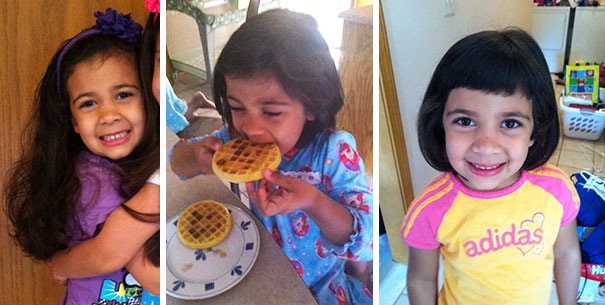 Three children, with one having cut her own hair, smiling and playing indoors.