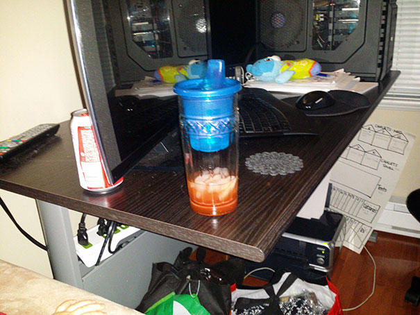 I Told My One Year Old Son He Could Sit With Me And Put His Water In The Same Spot As Daddy's Drink. Technically, He's Not Wrong