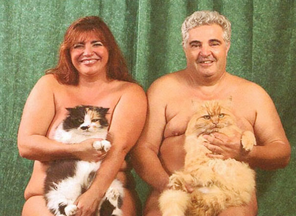 Men Posing With Cats