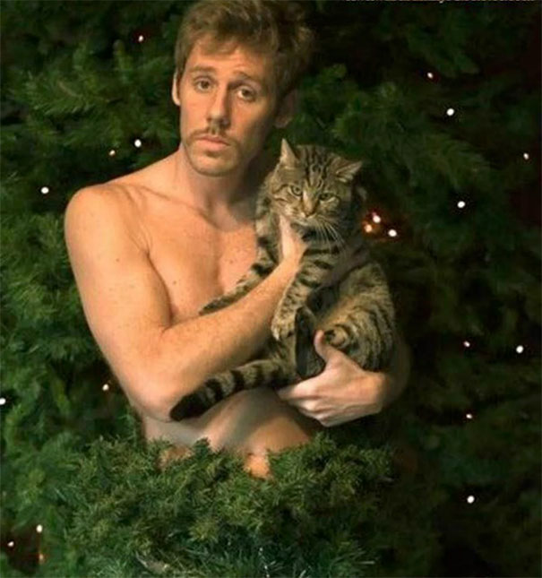 Men Posing With Cats