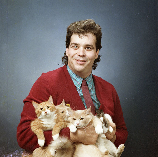 Men Posing With Cats