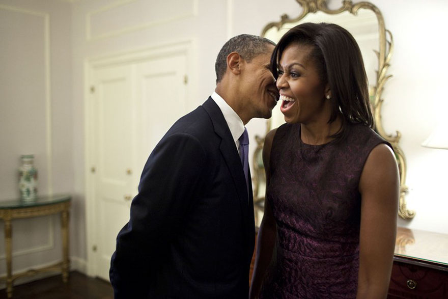 The president whispering something to his wife 