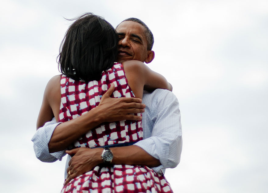 Barack hugging Michelle 