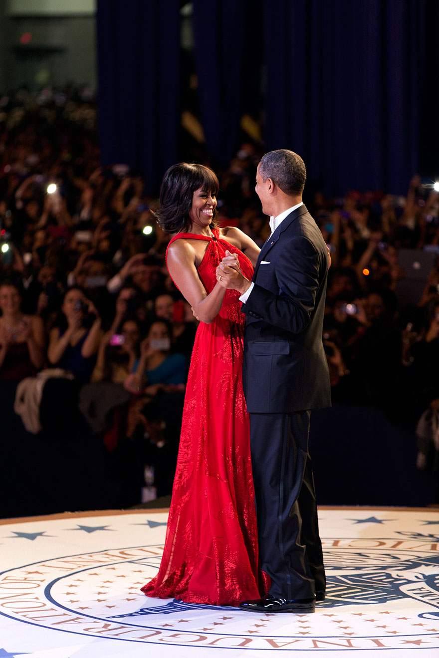 Barack and Michelle dancing and smiling 