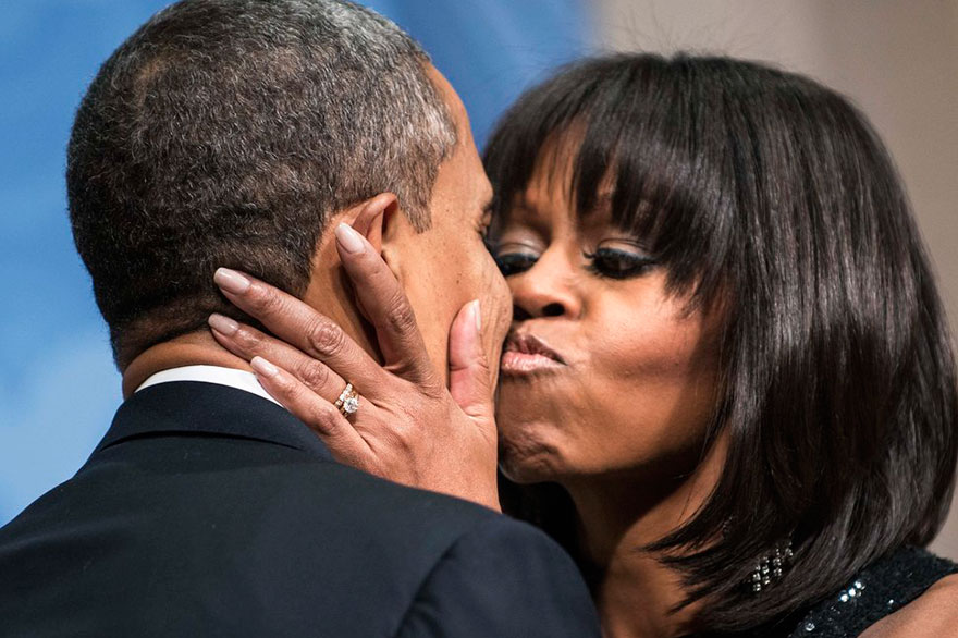 Congratulation kiss from Michelle Obama