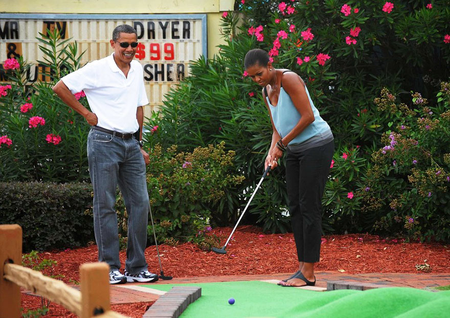 Barack and Michelle playing golf 