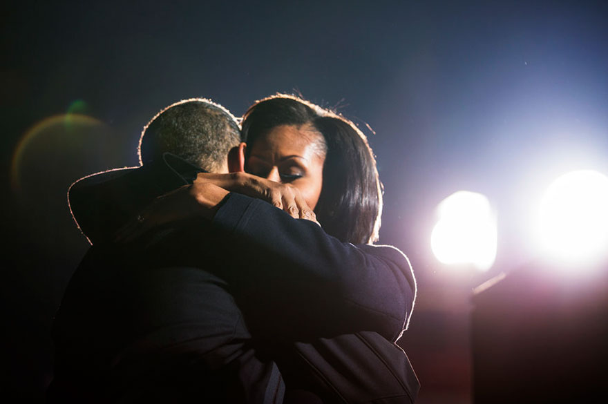 President Barack Obama hugging First Lady Michelle Obama