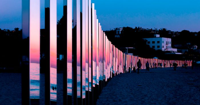 Quarter Mile Of Mirror Poles Reflect The Sunsets And The Changing Tides