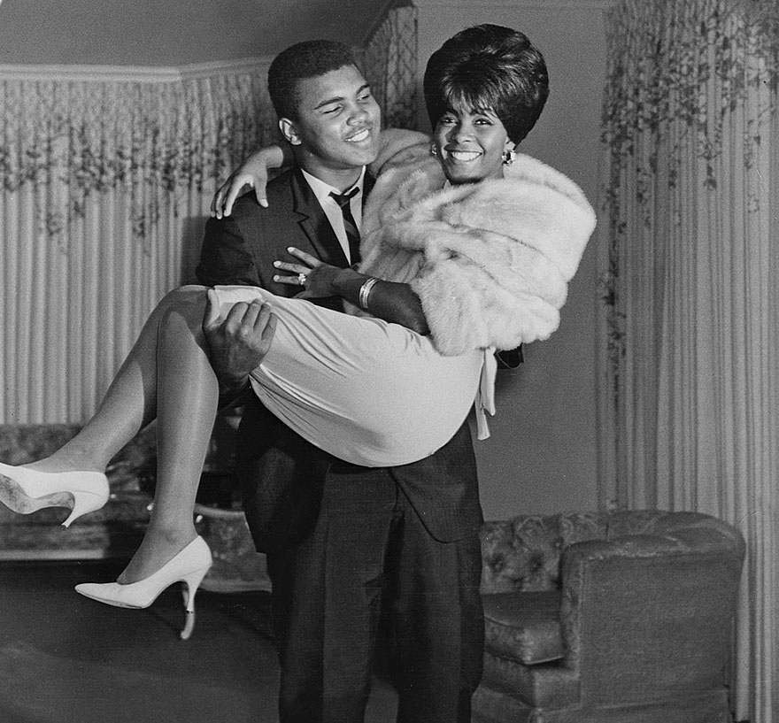 Muhammad Ali Is Photographed Carrying Then Wife, Sonji Clay, Over The Threshold After Their Wedding, 1967