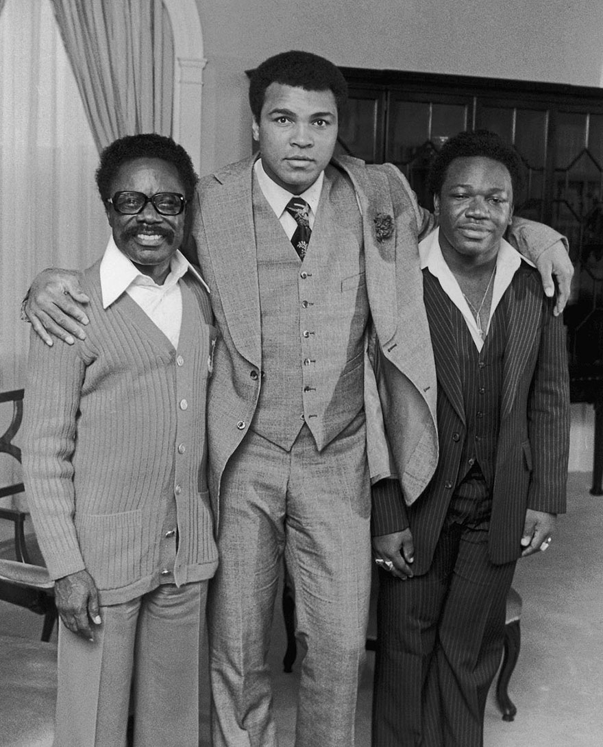 Muhammad Ali Is Photographed With Omar Bongo (Formely Known As Albert Bongo) The President Of Gabon, And His Son Alain At New York's Waldorf-Astoria Hotel On October 21, 1977