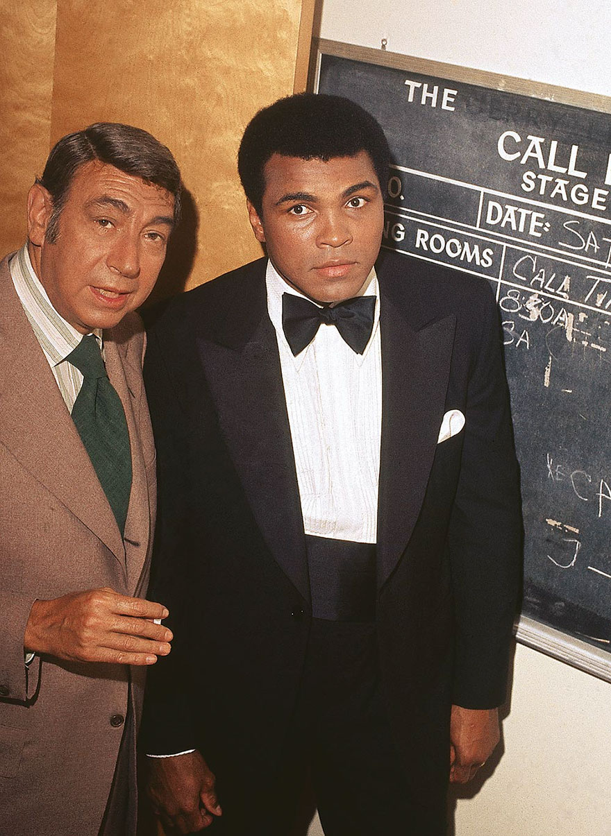 Muhammad Ali Is Photographed With Howard Cosell Backstage Before "The Muhammad Ali Variety Special" In July Of 1975