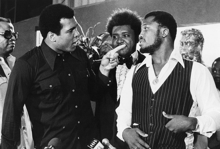 Sports Promoter Don King Stands Between Muhammad Ali, Left, And Joe Frazier In New York, Thursday, July 17, 1975, After It Was Announced That Ali And Frazier Will Meet In A Title Bout Dot