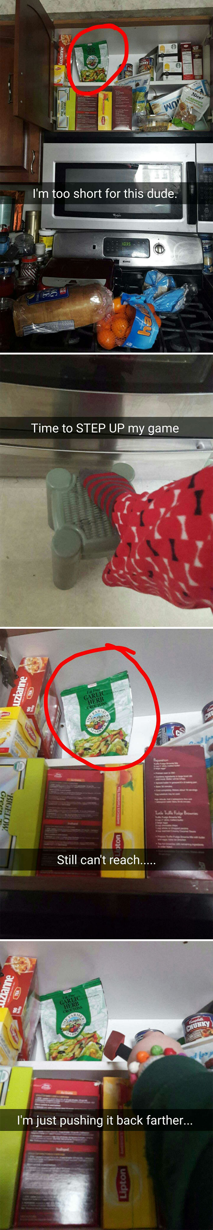 Unable to reach top shelf items, even with a step stool, highlighting short people problems with kitchen shelves.