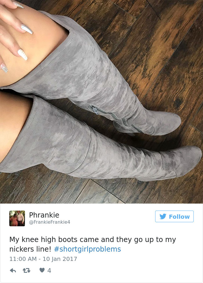 Person wearing gray knee-high boots, highlighting short people problems with humor on social media.