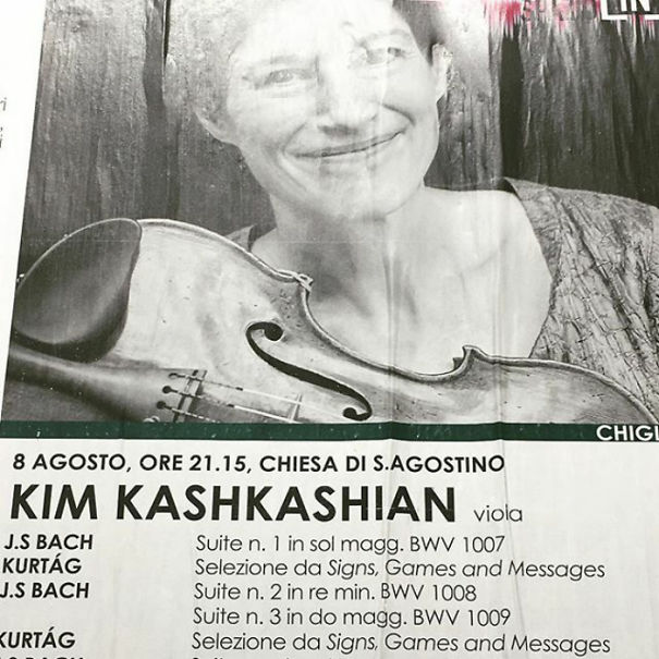 A poster of a musician with a viola, featuring the funny name "Kim Kashkashian" and event details in Italian.