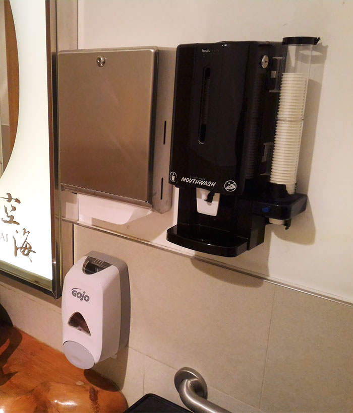 mouthwash dispenser in the bathroom