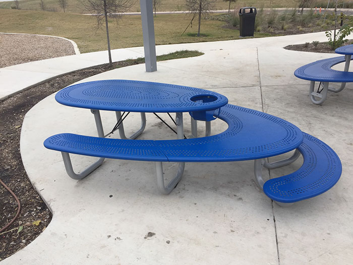 blue picnic table with seatings of different sizes