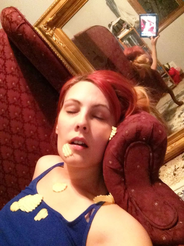 Woman taking selfie while fall asleep 