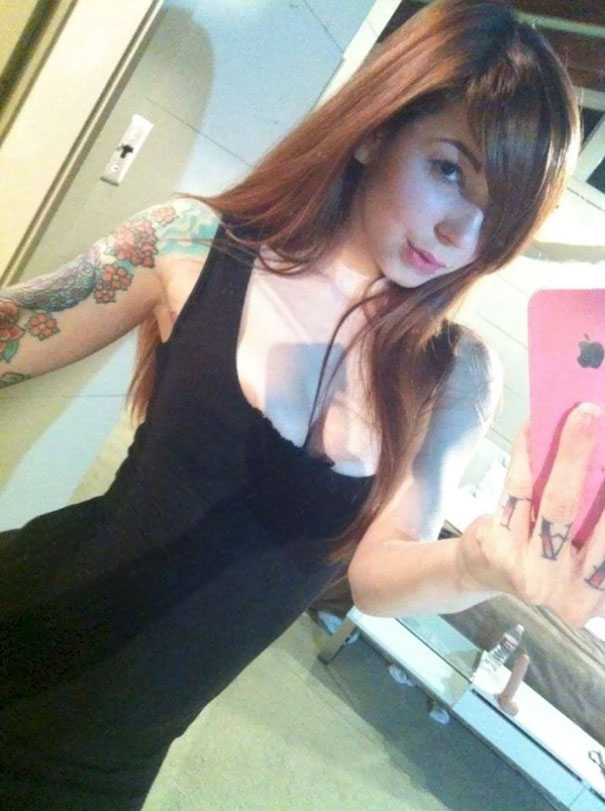 Girl taking mirror selfie 