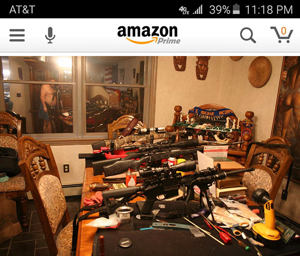 Naked man in the window reflection 