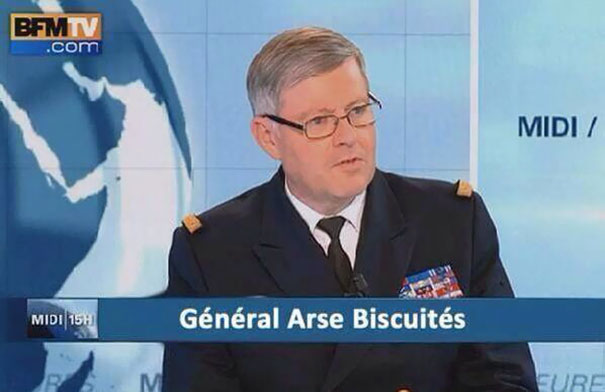 Man in military uniform on TV with funny name captioned as "Général A**e Biscuités".