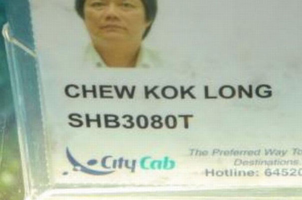 Funny name badge for CityCab driver with ID and contact number.