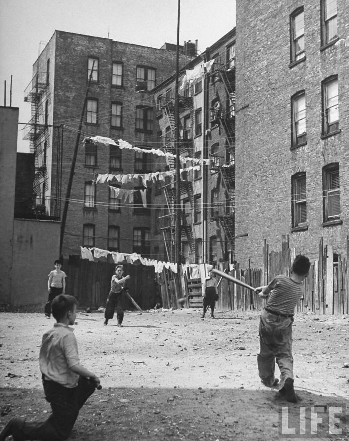 Young Boys Playing Stickball In Vacant Lot Next To An Apartment Building, New York, 1947