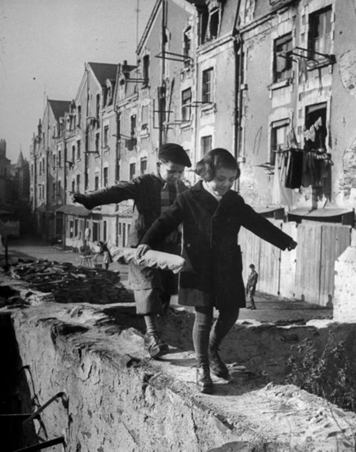 Children Balancing On A Wall, France, 1949