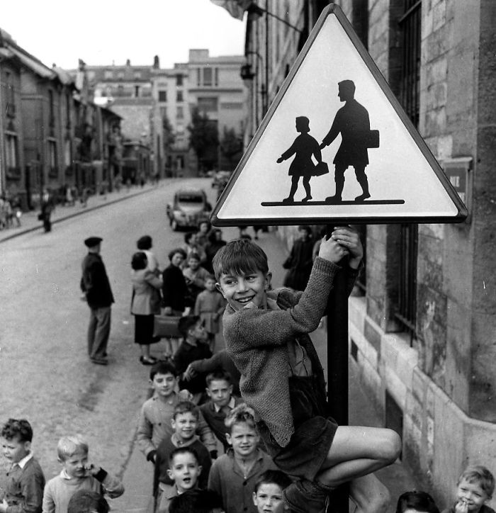 Boy Climbing A Pole, Paris