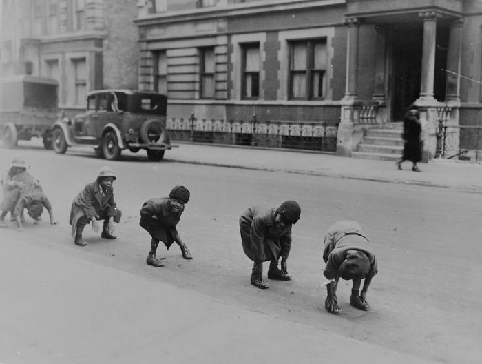 Children Playing A Game Of Leap-frog In A Street In Harlem, New York, 1935
