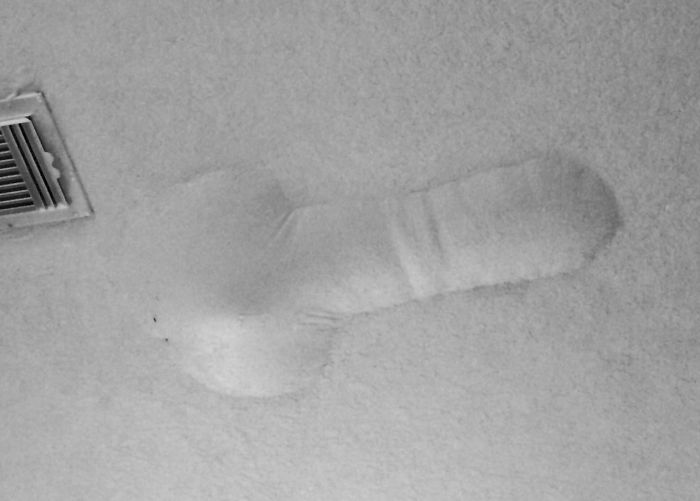 Creative dad joke taken to another level with a humorous ceiling design in a home.