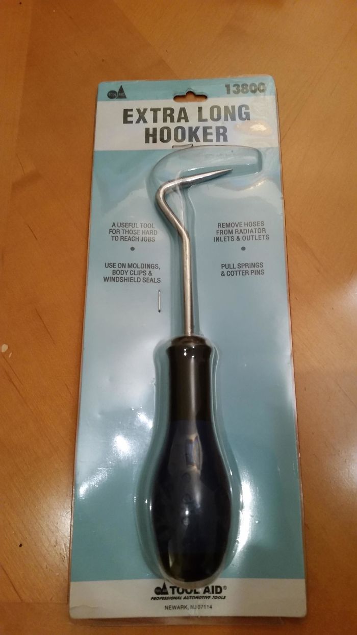 Extra long hook tool on packaging, used for jokes and humor by dads.
