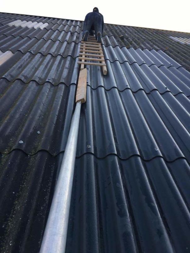 Person on a makeshift ladder atop a corrugated roof, illustrating risky behavior in a series about longevity differences.
