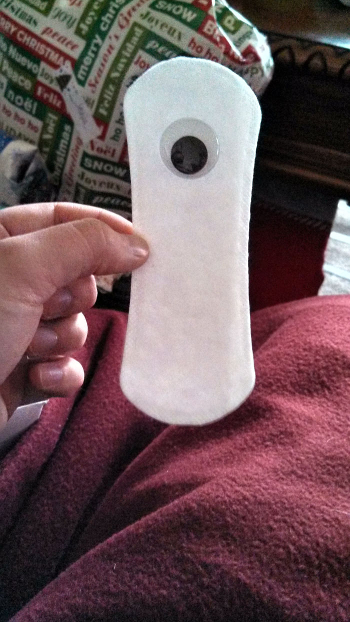 Dad joke level: gift padded with giant googly eye, hand holding it up humorously.