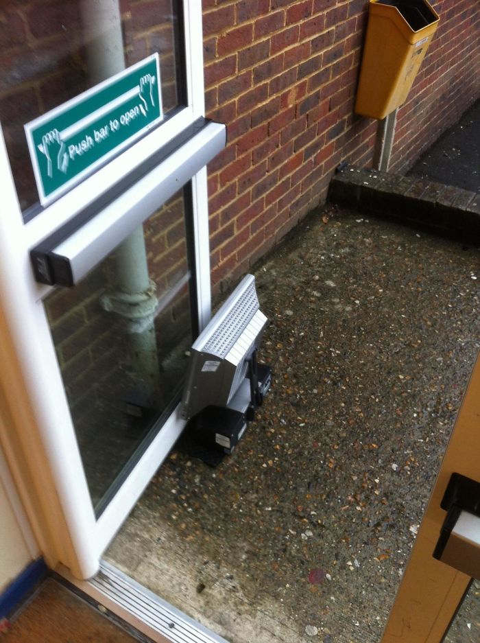 Door blocked by a heater illustrating lack of care.