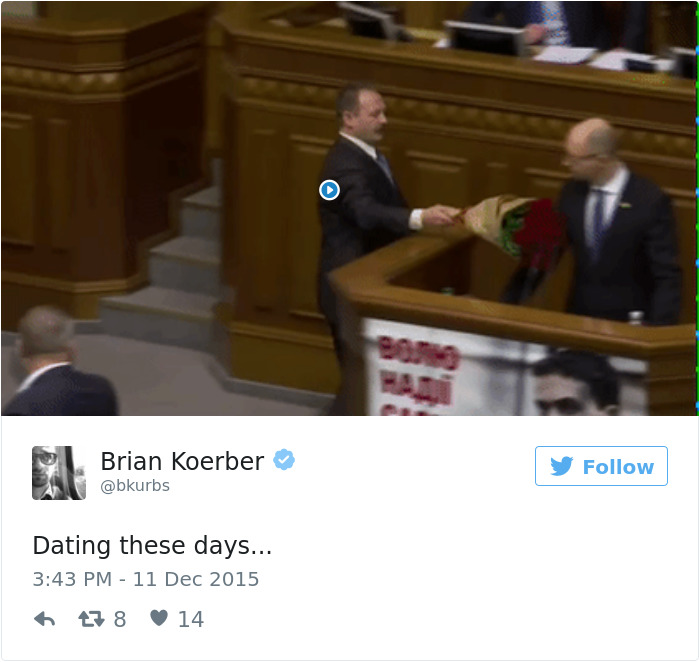 Dating tweet humorously depicted with two men exchanging flowers in a formal setting.