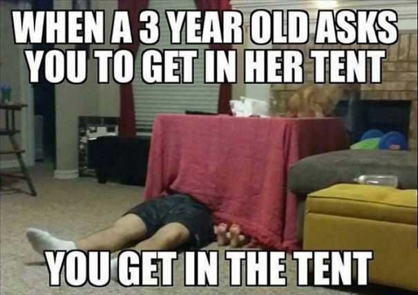 Parenting meme showing a person humorously squeezed under a makeshift tent, capturing relatable parenting moments.