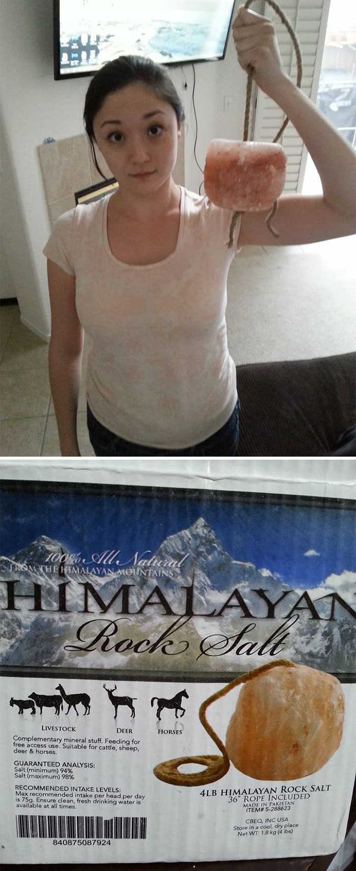 Woman holding Himalayan rock salt as a dad joke prop.