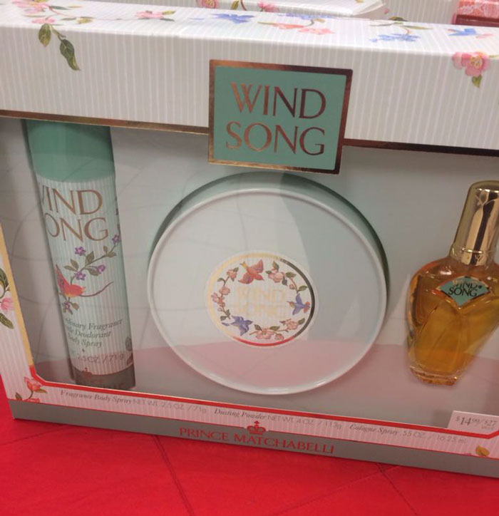 "Gift set of Wind Song fragrance with body spray and cologne bottle, exemplifying dads' humor taken to another level."