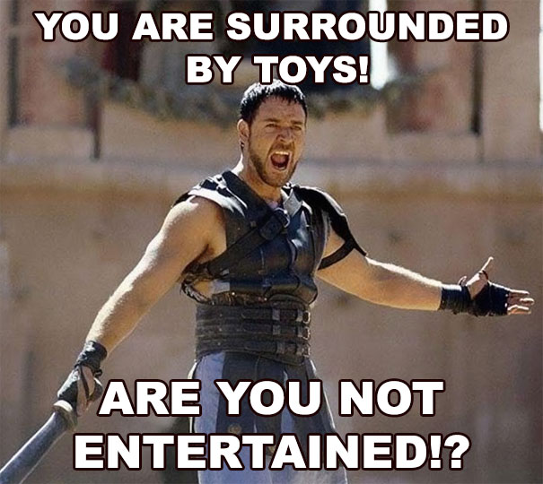 Parenting meme with gladiator shouting, "You are surrounded by toys! Are you not entertained?"