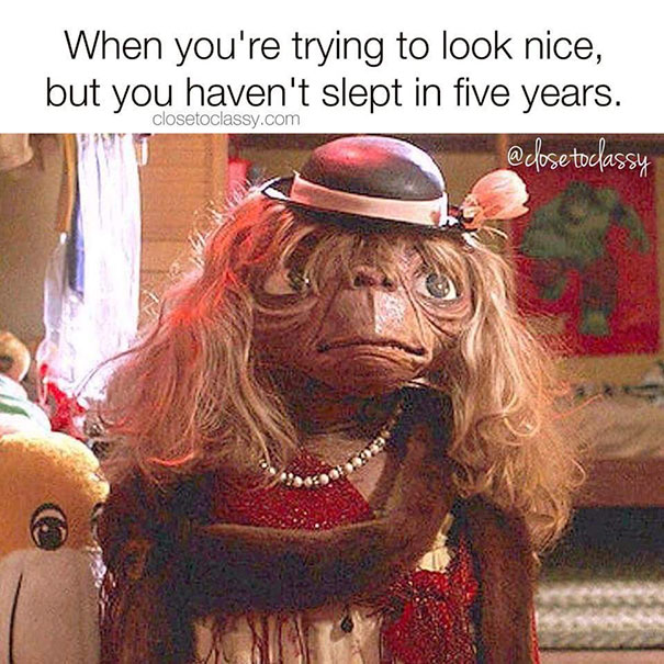 ET dressed humorously in a wig and hat, illustrating a parenting meme.