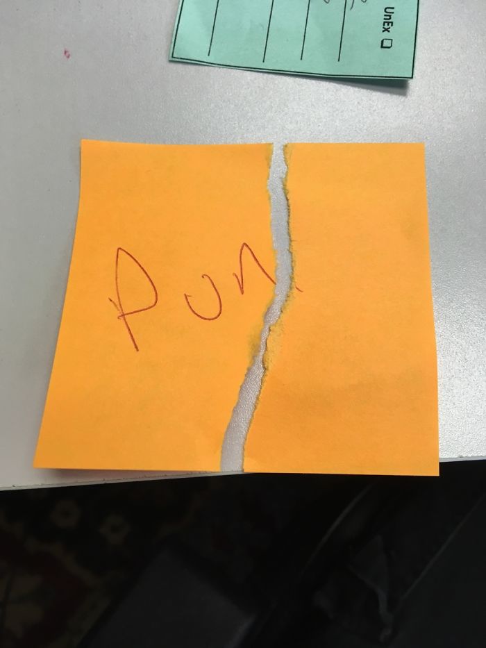 A torn sticky note with "Pun" written on it, illustrating a dad joke taken to another level.