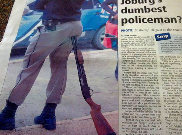 Police officer leaning on a s*****n in a newspaper article about safety practices, highlighting why women live longer.
