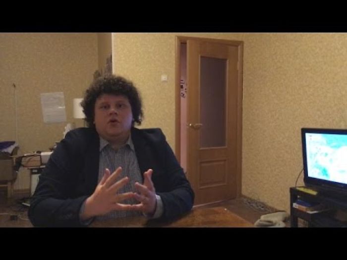 Russian Man Tries To Give Serious Interview On Bbc, Forgets He Has A Bear