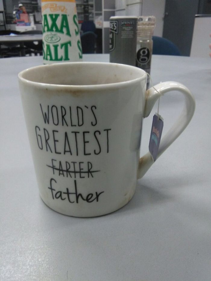 Mug with "World's Greatest Farter" humorously corrected to "Father," showcasing hilarious wives' humor.